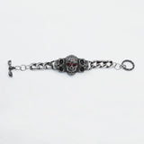 Bracelet gothique vintage avec crâne et yeux rouges