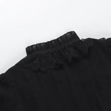 Chemisier gothique victorien noir en dentelle à taille cintrée