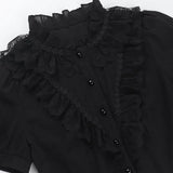 Chemisier gothique victorien noir en dentelle à taille cintrée