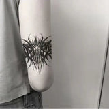 Gotisches Dornen-Tattoo